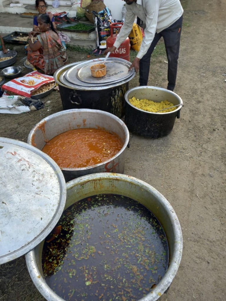 Large pots of dal, sabzi and rice prepared for seva